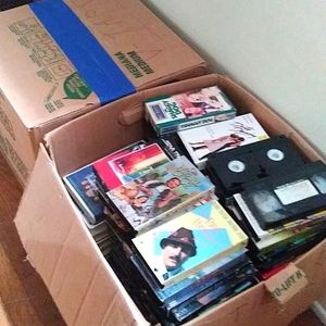 2 boxes of VHS tapes